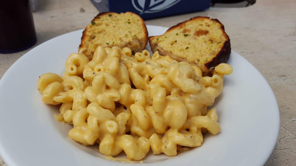 Mac & Cheese* · Rich and delicious. Creamy three-cheese mac sauce and cavatappi noodles. Served with garlic toast.