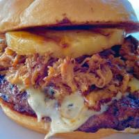 Pork & Pineapple · Char-grilled burger layered with swiss cheese, grilled pineapple, pulled pork and soy garlic...