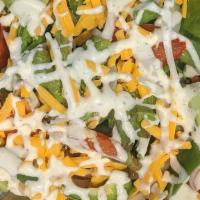Southwest Chicken Salad · Large. Leafy greens topped with chipotle-seasoned chicken breast or black bean veggie crumbl...