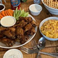 Family Wings Meal · 18 wings, fixins, mac, and cheese and choice of tots or waffle fries.