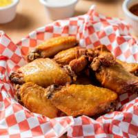 Wings · All orders served with your choice of dry (sauce on side) to preserve crispness and freshnes...