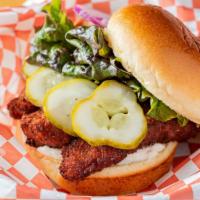 James Dean Sandwich · Classic fried chicken breast, lettuce, tomato, onion, pickles, and mayo.