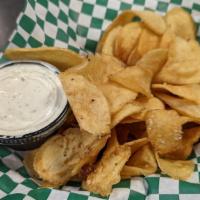 T.'S Kettle Chips · Fresh fried potato chips, cooked to a golden brown and served with a side of our house-made ...
