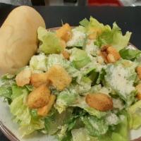 Chicken Caesar Salad · Fresh chopped Romaine lettuce, croutons, Parmesan cheese and Caesar dressing with a grilled ...