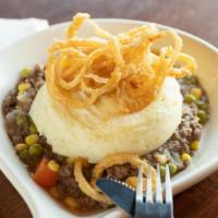 Shepherd'S Pie · Seasoned lamb and ground beef, stewed with peas, corn, carrots, and onions in our Tavern-mad...