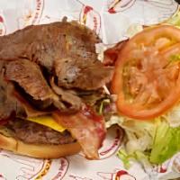 Fiesta Mega Burger · Gyro Meat, Bacon,  Crushed Red Peppers, Fresh Jalapenos, Grilled Onions, Mayo, Lettuce, Toma...