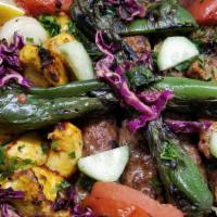 Mixed Grill Kebab · Combination of kofta kabob, chicken kabob, and shish kabob served with rice, grilled onions,...