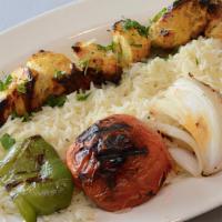 Chicken Kebab · Char-broiled marinated morsels of boneless skinless chicken breast with rice, grilled onions...