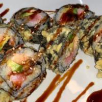 Yum Yum (Giant Roll 8) · tempura roll of tuna, salmon, eel avocado, topped with eel sauce.
