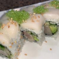 White Dragon · yellowtail, scallion, avocado, cucumber, topped with escolar, wasabi tobiko.

Consuming raw ...