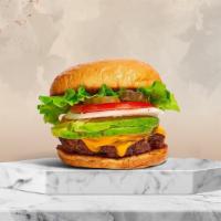 Vote For Cado Burger  · American beef patty topped with avocado, melted cheese, lettuce, tomato, onion, and pickles....