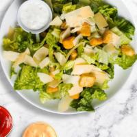 Classic Caesar Salad  · Fresh romaine lettuce topped with grated parmesan, seasoned croutons, tomatoes and tossed wi...