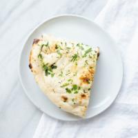 Garlic Naan · White bread topped with garlic and cilantro.