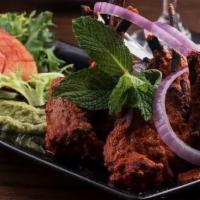 Chicken Tandoori · A lean, halved-chicken marinated in yoghurt with mild spices and fresh herbs then barbecued.