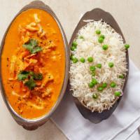 Chicken Tikka Masala · Broiled bites of chicken slow cooked in a buttery sauce filled with mild onions and red-ripe...