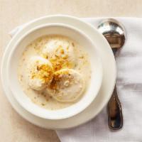 Ras Malai · Our flaky, house-made cheese pastry served in a dollop of sweat cream and sprinkled with col...