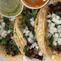 3 Taco Meal  · 3 Tacos with choice of meat topped with cilantro and onions, limes and salsa.. Served with r...