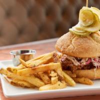 Pulled Pork · Hand pulled and house smoked pork shoulder, housemade BBQ sauce, cider mustard, coleslaw,  s...