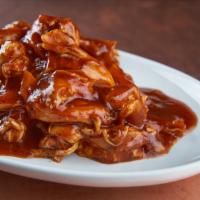 Pulled Chicken In Housemade Bbq Sauce · House-smoked pulled BBQ chicken, housemade BBQ sauce