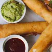 Jumbo Toothpicks · Deep fried flour tortillas filled with tinga chicken, guacamole, crema and chipotle BBQ