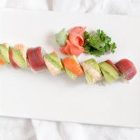 Star Rainbow · Eight giant pieces of California roll with snow crab over layer with, tuna, salmon  and unag...