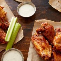 The Bracket Buster · A 32 count order of wings in two different flavors, with 4 Fries and 4 Drinks. Comes with Ra...