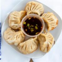 Fried Dumplings (6) · Also known as pot stickers. Seasoned ground pork dumplings, first steamed and then browned i...