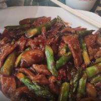 Beef With Asparagus · Hot and spicy. (In season only) sliced tender beef with mushrooms and fresh asparagus in sze...