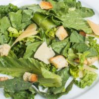 Caesar Salad · Romaine lettuce, croutons and Parmesan cheese with caesar dressing.