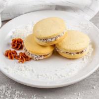 Alfajores · Pack of 3 South American cookies filled with dulce de leche and coconut.