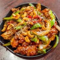 Ch22. Dragon Chicken · Chicken strips sautéed and topped with green pepper and sesame seeds with cashew nut.