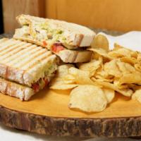 Flying Scotsman Sandwich · Grilled sourdough smothered in aged provolone, layered with plump grilled chicken breast, sa...