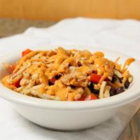 Southwest Bowl · Vegetarian. Roasted red pepper, black beans, corn, onion straws, topped with a spicy chipotl...
