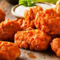Boneless Chicken Wings · Pieces of all-white, boneless chicken breast lightly breaded and cooked to crisp perfection,...