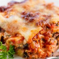 Lasagna · Layers of spinach and three cheeses topped with our meat or marinara sauce.