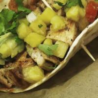 Maui · Two grilled flour shell tacos with grilled chicken, teriyaki, mango, and pico-de-gallo.