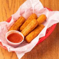 Mozzarella Cheese Sticks · Golden fried to their stringy deliciousness! Served with marinara dipping sauce.