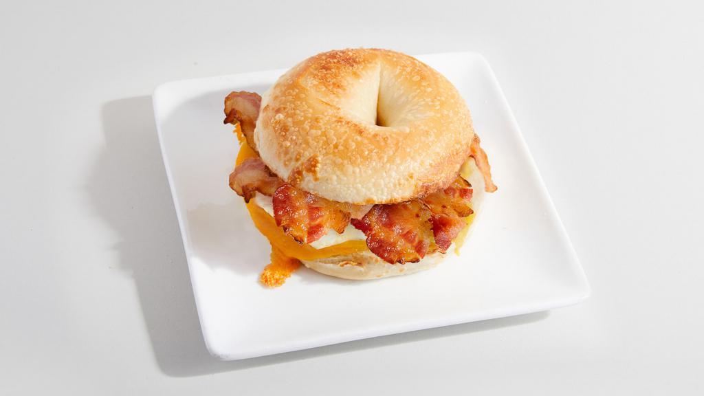 Bagel Sandwich - Bacon, Egg & Cheese · Made to order breakfast sandwich. Toasted bagel filled with bacon egg & cheese.