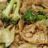 Phad Sea Eaw · Flat rice noodles stir-fried with garlic, eggs, baby bokchoy, broccoli, mushrooms, and sweet...