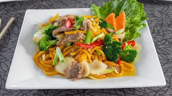 Green Curry Thai Lo Mein Noodles · Egg noodles with bell peppers, celery, baby bok choy, and onions seasoned with a green curry sauce.