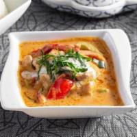 Panang Curry · Peanut butter based curry & coconut milk prepared with bell peppers.