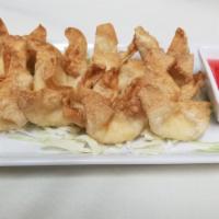 Crab Rangoon (8) · Fried wonton filled with cream cheese blended with garlic seasoning served with homemade swe...