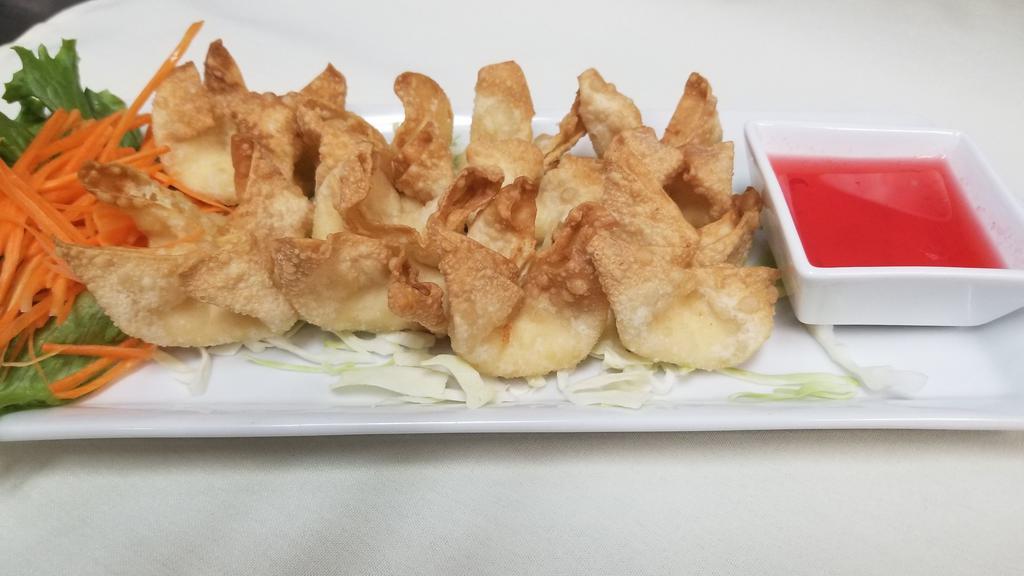 Crab Rangoon (8) · Fried wonton filled with cream cheese blended with garlic seasoning served with homemade sweet and sour sauce.