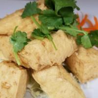 Crispy Tofu · Deep fried tofu served with crushed peanut sauce.