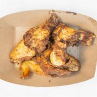 Wings (6 Pieces) · Southern rubbed wings tossed in your choice of sauce.