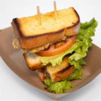 Fried Chicken Sandwich · Crispy fried chicken breast, lettuce, tomato, pickle, jalapeño mayo, served on Texas toast