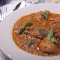 Chicken Curry · Boneless pieces of dark meat chicken cooked in medium spiced sauce and garnished with curry ...