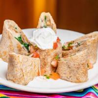 Spinach And Mushroom Quesadillas · Served with a wheat tortilla with Morita sauce.