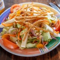 Colima Salad · Fresh mixed greens, tomato, red onion, pineapple, mushrooms, skirt steak, chipotle aioli in ...