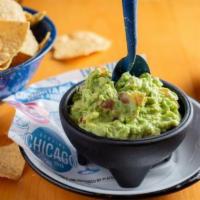 Guacamole · Homemade avocado dip with onions, tomatoes, cilantro and lime juice.